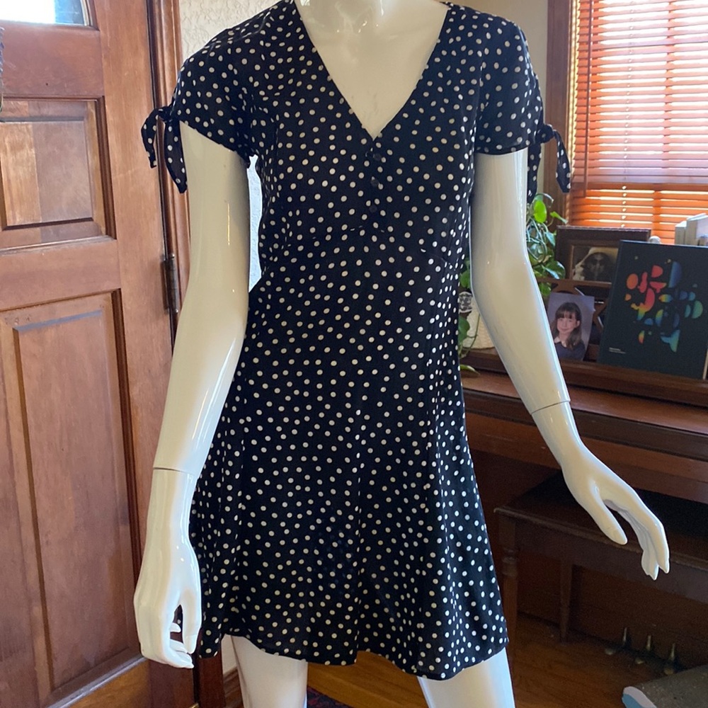 Black and white polkadot mini dress. Size 4.
